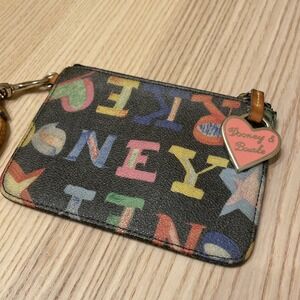 Dooney and Bourke, wristlet, multicolor. 5.5" x 4", coin purse, wallet